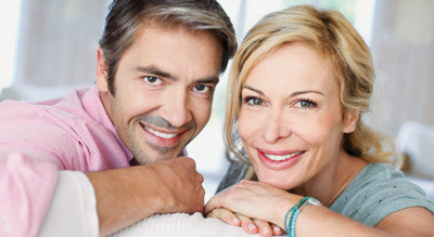 Man and woman smiling with the beautiful white teeth